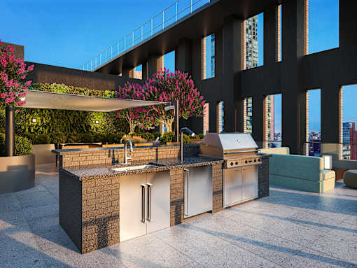 A modern outdoor kitchen with a grill and sink.