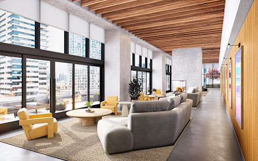 A modern living room with a long couch and a coffee table.