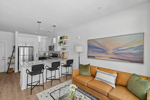 Open concept kitchen and living room at Link ® Lake Park Apartments, Smyrna, Georgia