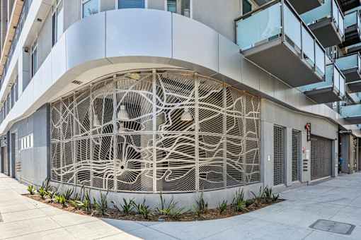 a building with a large mural on the side of it at Link Apartments® Four 12, California, 94607