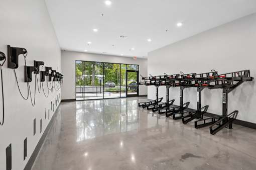 Fitness center bike storage with charging stations at Link ® Lake Park Apartments, Smyrna, GA