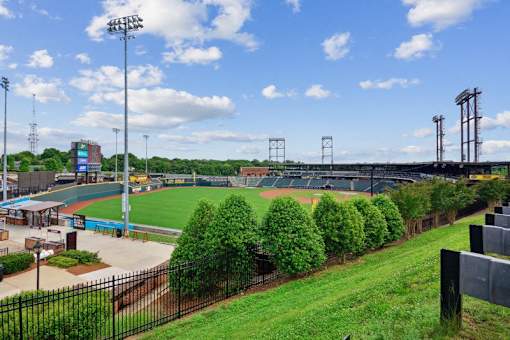 a view of a baseball field at a stadium at Link Apartments® Brookstown, North Carolina