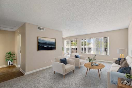the living room of an apartment with couches and a table