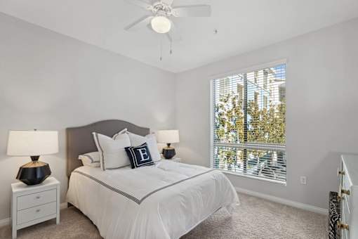 Spacious bedroom with a large window