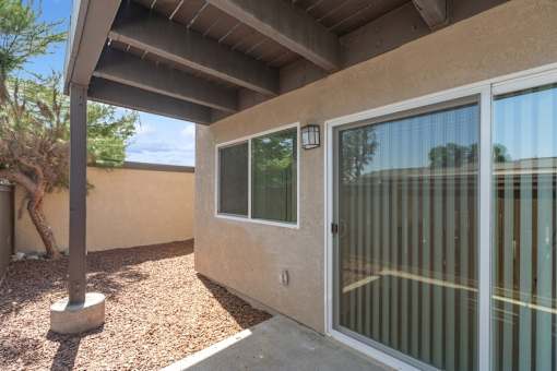 private patio with sliding glass door