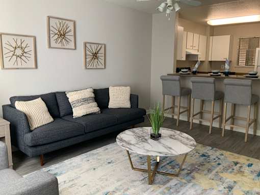 Modern Living Room With Kitchen View at Del Norte Place Apartment Homes, El Cerrito, CA