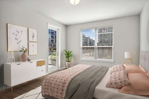 an image of a bedroom with a bed and a window