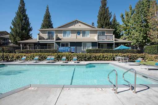 Swimming Pool And Relaxing Area at Atwood Apartments, California