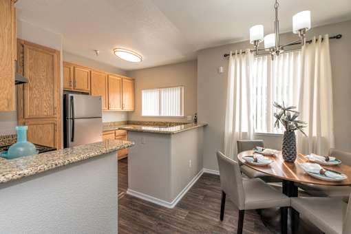 Dining Room and Kitchen View at Atwood Apartments, California, 95610