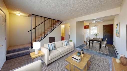 a living room with a couch and a table