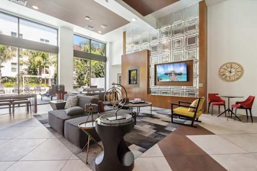a living room with a couch and a tv