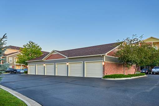 a car garage in front of a house