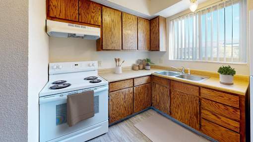 a kitchen with a stove and a sink