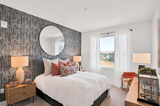 primary bedroom at Aya Apartments