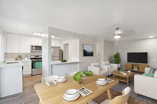 a living room and dining room with a table and chairs