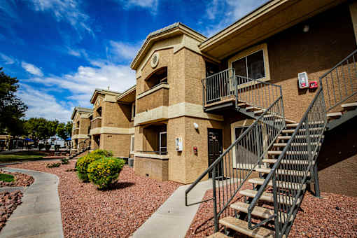 A building with a staircase leading to the second floor.