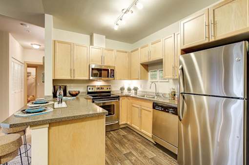 Refrigerator with Ice Maker, at Newberry Square Apartments, Lynnwood, Washington