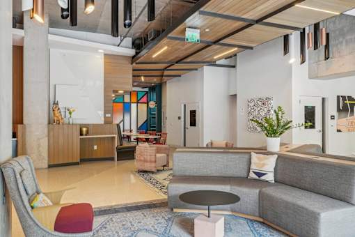 a living room with a couch and a table