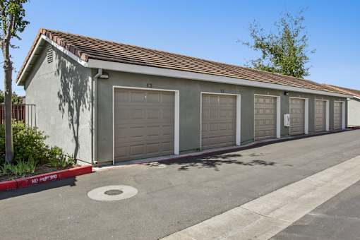 A row of garage doors are closed.