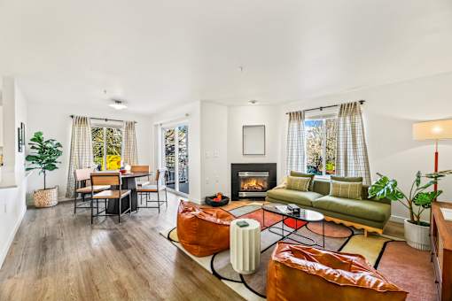 A living room with a fireplace and a couch.