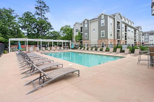 Pool with sun loungers