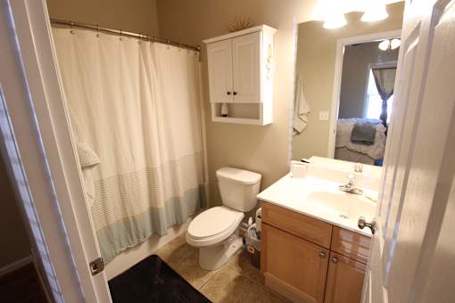 a bathroom with a toilet and a sink