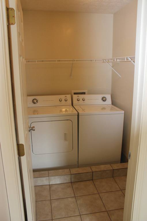 a washer and dryer in the laundry room