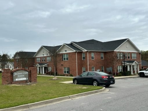 A car parked in front of Jackson Creek Station