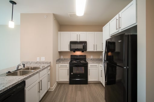 500 Northside Apartments Kitchen with stove, microwave, oven, refrigerator, sink