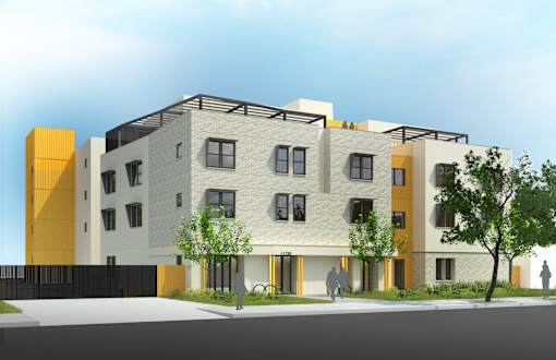 A modern building with a yellow and white facade.