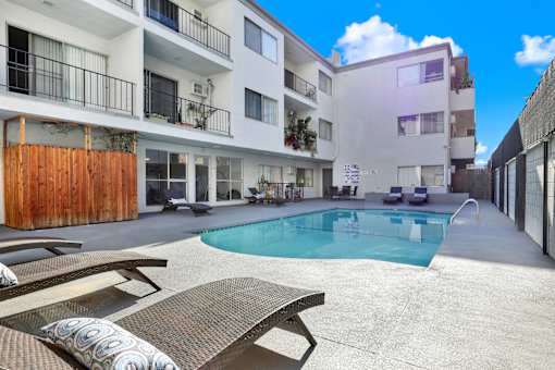 Pool With Relaxing Chairs at Chateau La Fayette, Los Angeles