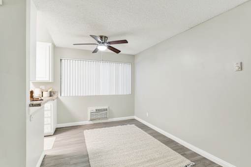 Room with Window, Ceiling Fan and Kitchen View at La Fayette Marquis, Los Angeles, 90057