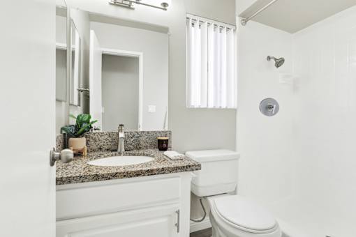 Bathroom with Sink and Mirror at La Fayette Marquis, Los Angeles
