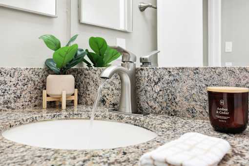 Bathroom with sink and faucet at La Fayette Marquis, Los Angeles, CA