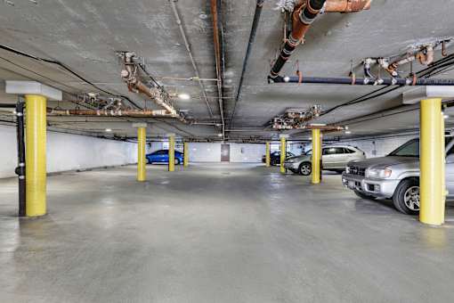 Parking garage with cars at Occidental Apartments, Los Angeles, CA