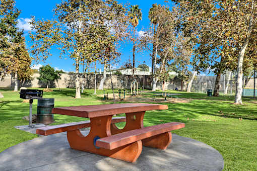 Picnic table sits in park at Hobart Apartments, Los Angeles