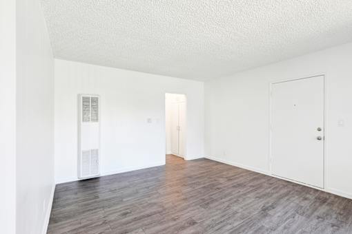 A room with a white door and a window at Sylvan Gardens,Van Nuys,California