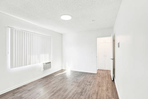 A room with a window and a door at Sylvan Gardens,Van Nuys,91401