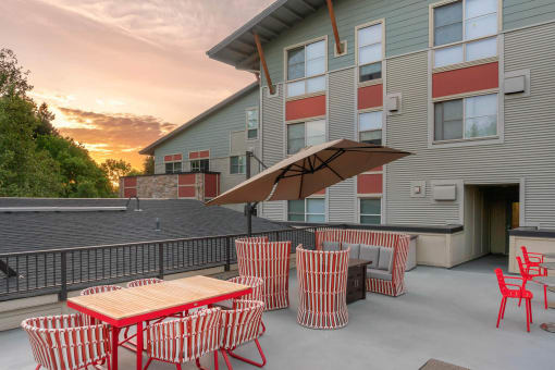 our apartments have a large patio with tables and chairs at Delano, Redmond Washington