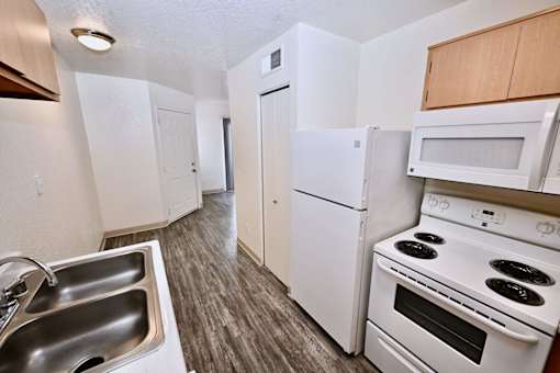 Kitchen with white appliances at Mountain Vista, Sierra Vista, AZ, 85635