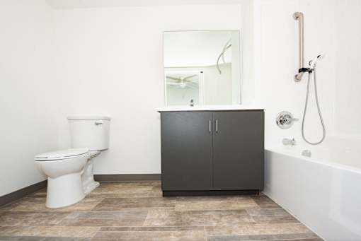 an image of a bathroom with a toilet and a sink