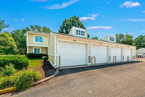 A row of garages with the number 646 on the top one.