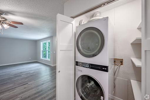 A washer and dryer are installed in a laundry room.