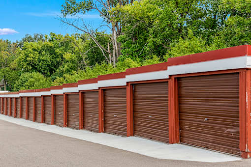 A long row of brown garage doors.