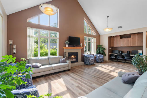 a living room with a couch and a fireplace