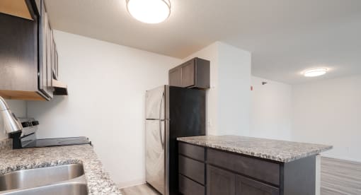the kitchen of our studio apartment atrium with stainless steel appliances