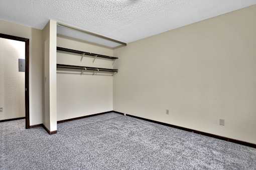 our apartments have a spacious living room with a door to the laundry room