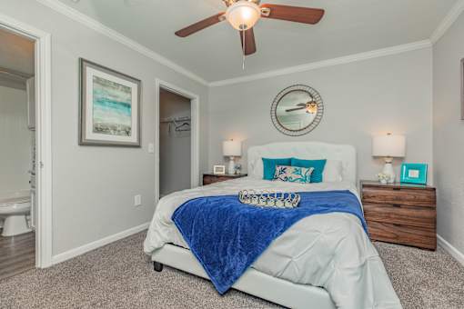Bedroom with a Large Bed and Nightstand at Oxbow Hill Country, Boerne
