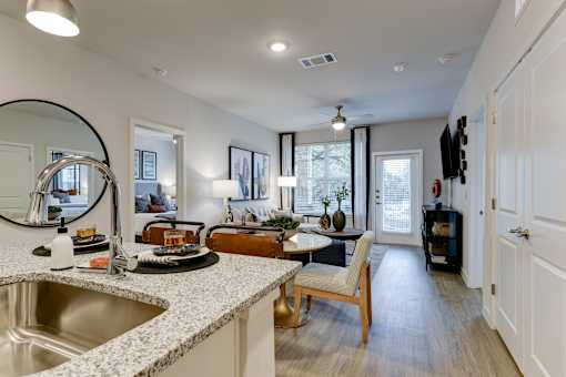 a living room with a couch and a table at Estraya Boerne, Texas