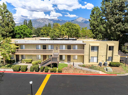 A building with a mountain in the background.